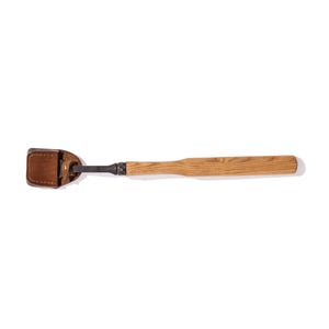 May include: A wooden handled tool with a leather sheath. The tool has a metal blade and a wooden handle.