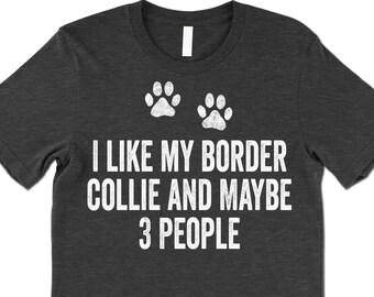 May include: Dark heather grey t-shirt with white paw prints and the text "I like my Border Collie and maybe 3 people".