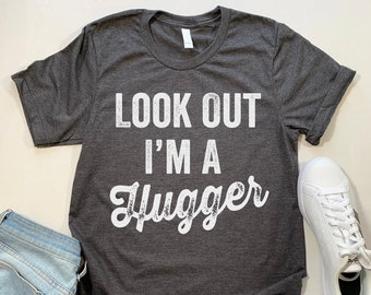 Look Out I'm A Hugger T Shirt. Funny Hug Hugging Shirt.