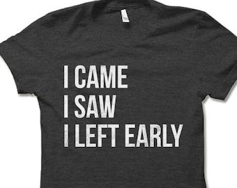 May include: A dark grey t-shirt with the text "I came I saw I left early" printed in white.