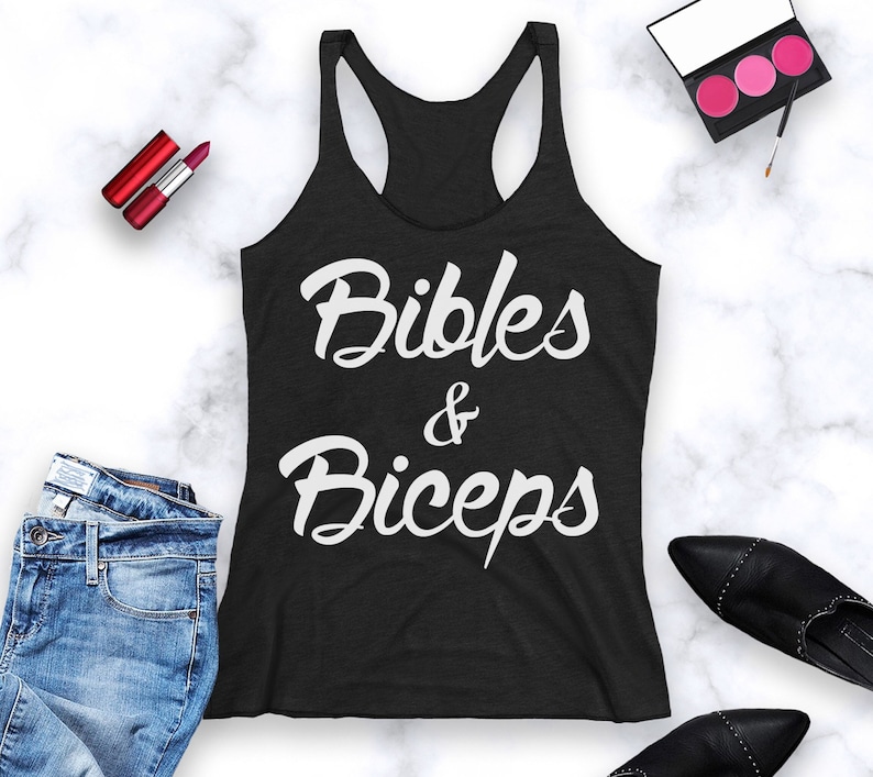 May include: Black tank top with white text that reads "Bibles & Biceps".