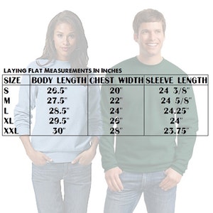 May include: Size chart for a sweatshirt showing measurements in inches for body length, chest width, and sleeve length. The chart includes sizes S, M, L, XL, and XXL.