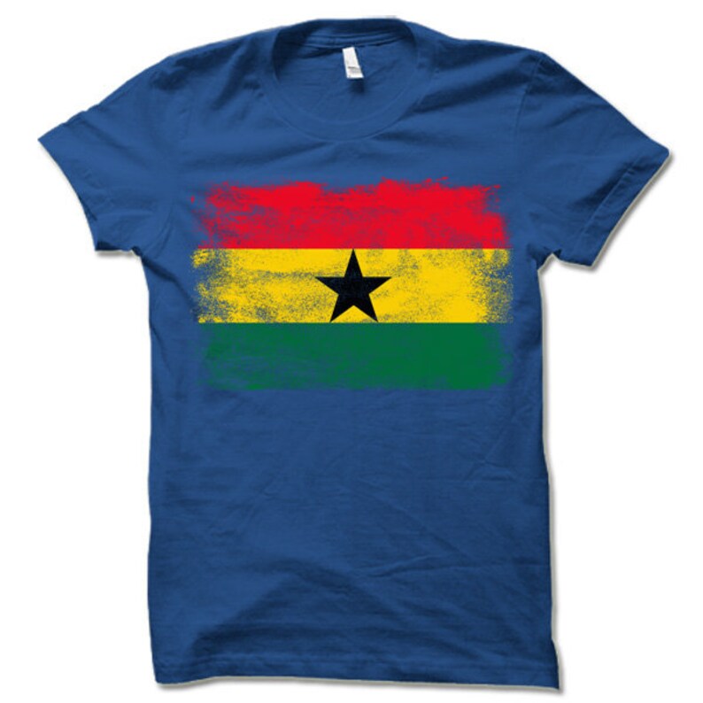 May include: A royal blue t-shirt with a distressed, faded print of the flag of Ghana. The flag features red, yellow, green, and a black star.