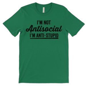 May include: Green t-shirt with black text that reads "I'm not antisocial I'm anti-stupid."
