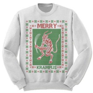 May include: White Christmas sweater with a red and green knit pattern. The sweater features a red illustration of Krampus, a mythical creature, with the text "Merry Krampus".