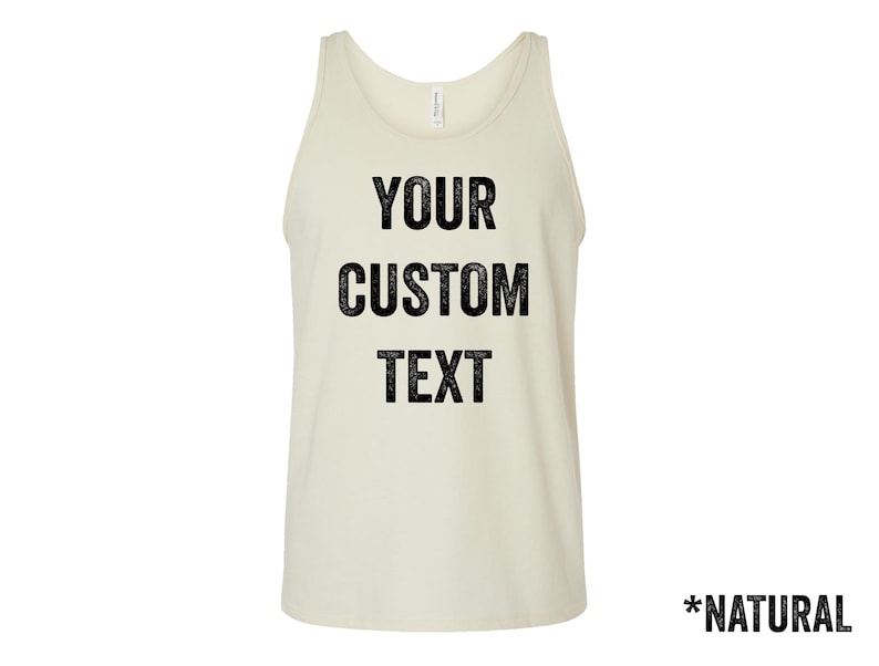 May include: A natural-colored tank top with the text "YOUR CUSTOM TEXT" printed in black. The tank top is sleeveless and has a scoop neck. The word "NATURAL" is printed at the bottom.