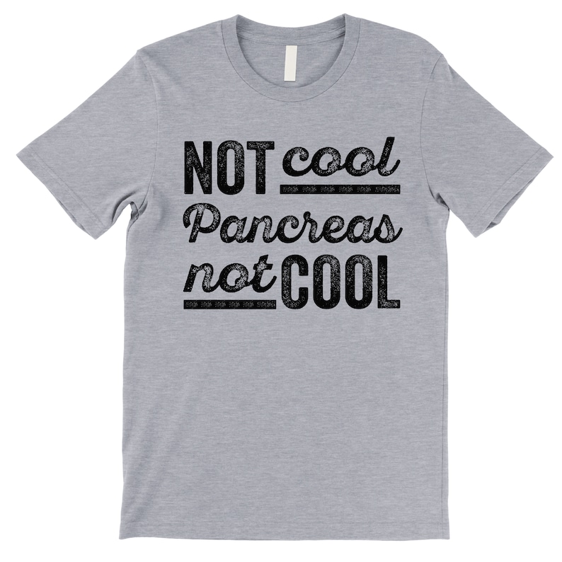 K&ouml;nnte beinhalten: Ein hellgraues T-Shirt mit schwarzem Text, der "NOT cool Pancreas not COOL" lautet.