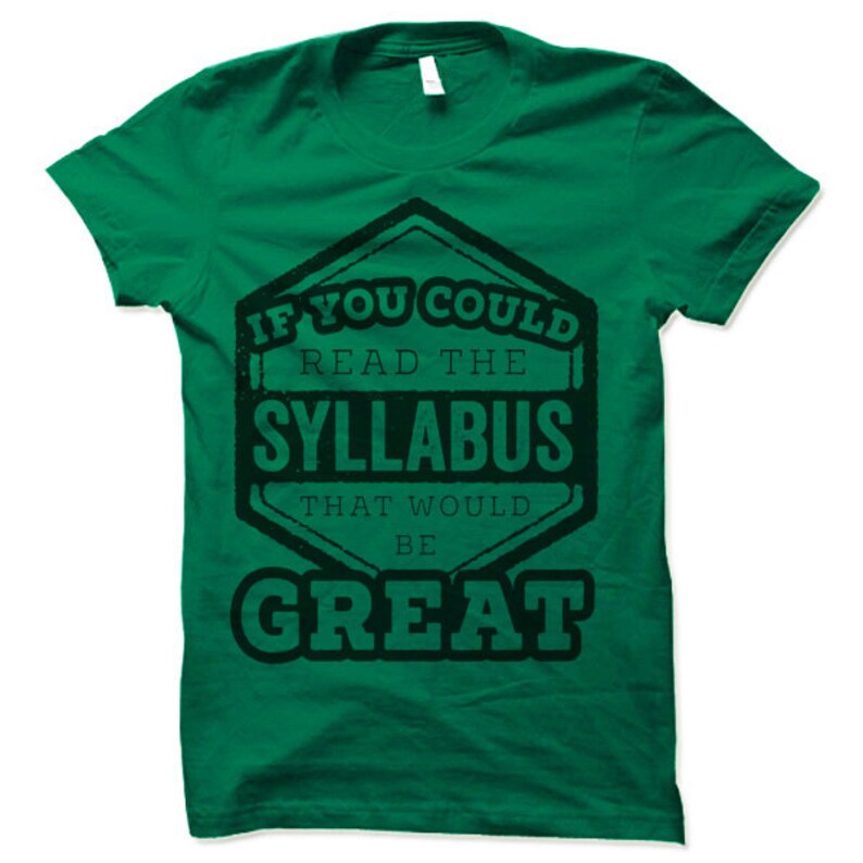 May include: Green t-shirt with a black distressed graphic that reads "If you could read the syllabus that would be great."