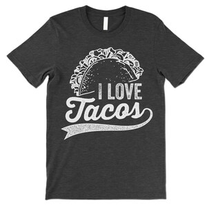 Może przedstawiać: Szary t-shirt z białym nadrukiem taco i tekstem "Uwielbiam tacosy".