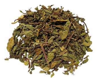 May include: A pile of dried green and brown mint leaves.