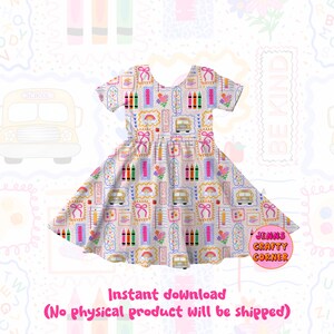 May include: A white dress with a school-themed pattern featuring school buses, pencils, rainbows, and the words "BE KIND." The dress has short sleeves and a flared skirt. The text "Instant download" is also visible.