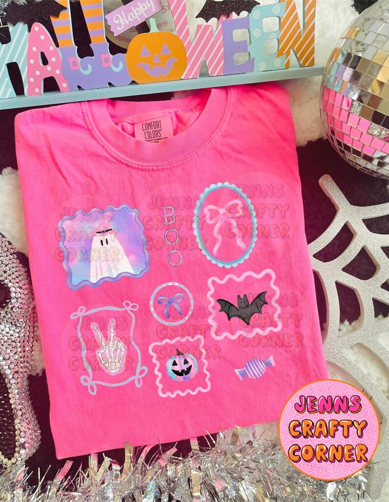 May include: A bright pink Comfort Colors t-shirt featuring Halloween-themed graphics. The shirt has several framed designs including a ghost, a bow, a bat, a peace sign skeleton hand, a jack-o'-lantern, and a candy. The text "JENNS CRAFTY CORNER" is also visible.