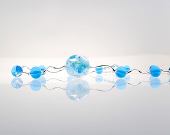 Underwater Garden is the name of this handmade Glass Bead Necklace, Silver Wave Elements