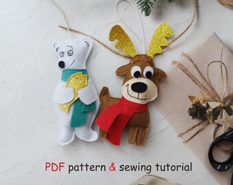 May include: Two felt ornaments featuring a white polar bear holding a gold glitter fish with a teal scarf and a brown reindeer with gold glitter antlers and a red scarf. The text PDF pattern & sewing tutorial is printed at the bottom.