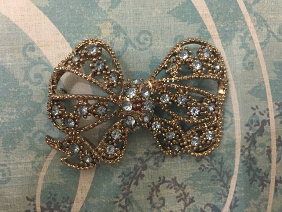 Vintage Silver Bow Brooch With Light Blue Crystals - image 1