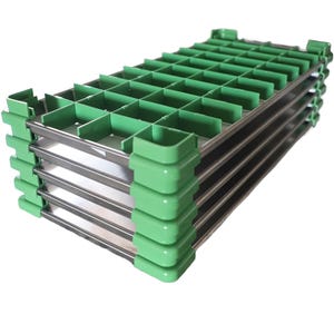 May include: Stack of four green and silver metal trays with a grid pattern. Each tray has a raised edge around the perimeter.