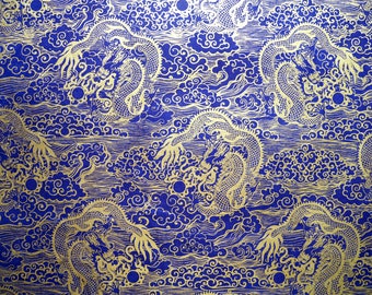 Loktapapier "Drachen und Wolken". Blau/Gold. Handgeschöpftes Nepal-Papier, bedruckt.