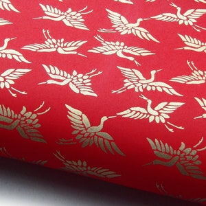 Papier japonais Chiyogami « Grues. Or sur rouge. » Yuzen