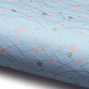 Papier japonais Chiyogami "Fleurs de cerisier. Rose et or sur bleu clair." Yuzen