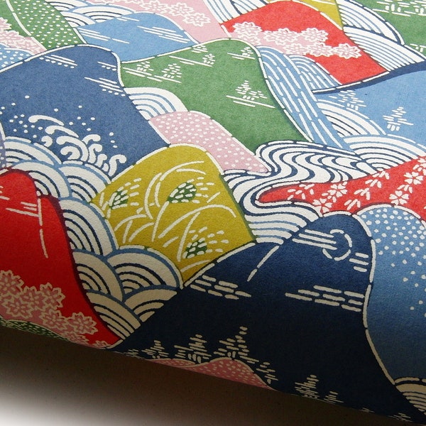 Japanpapier Katazome shi "Hügellandschaft mit Blüten, Wellen und Gräsern. Rot, Blau, Gelb, Grün und Rosa."