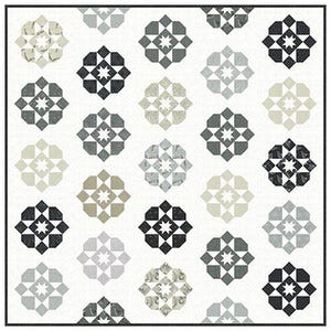 May include: A quilt pattern titled "Andromeda" by Melissa Corry. The design features repeating geometric shapes in shades of gray, black, and beige on a white background. The text "fat quarter friendly in 5 sizes" is also visible.