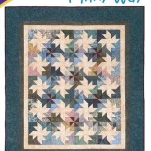 May include: A quilt pattern titled "Milky Way" by Cozy Quilt Designs. The quilt features a starburst pattern in shades of blue, green, and tan, with a dark teal border. The pattern includes throw, large throw, queen, and king sizes.