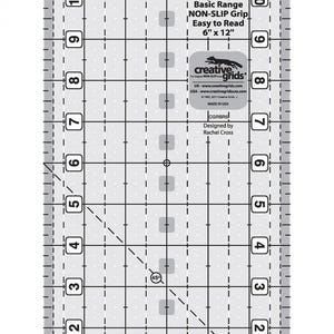 May include: A 6-inch by 12-inch clear ruler with a grid pattern and a 45-degree angle line. The ruler is labeled with numbers from 1 to 11 and has a non-slip grip. The ruler is made by Creative Grids.