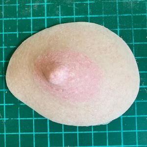 Silicone breast prop for use in film, tv, stage or cosplay.