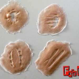 SFX zombie attack prosthetics. Made from gelatin and ready to apply and add blood. Create your undead zombie look with these pieces.