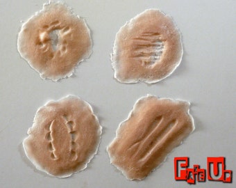 SFX zombie attack prosthetics. Made from gelatin and ready to apply and add blood. Create your undead zombie look with these pieces.