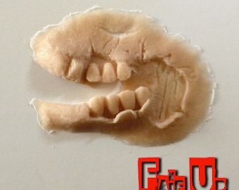 SFX Prosthetic ripped zombie jaw. Perfect for halloween, tv, film or cosplay.