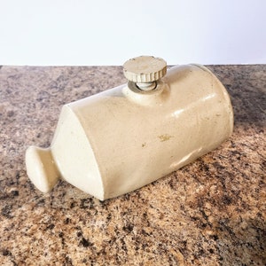 Scaldaletto in gres porcellanato anticato, con fondello in ceramica filettata originale