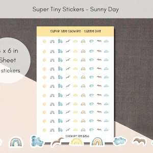 May include: A sheet of 99 tiny stickers featuring a sun, rainbow, and clouds in a watercolor style. The sheet measures 4 inches by 6 inches.