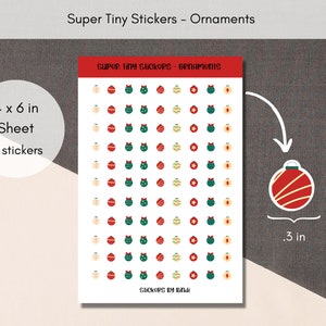 May include: A sheet of 99 small Christmas ornament stickers. The stickers are red, green, and yellow and measure 0.3 inches in diameter. The sheet measures 4 inches by 6 inches.