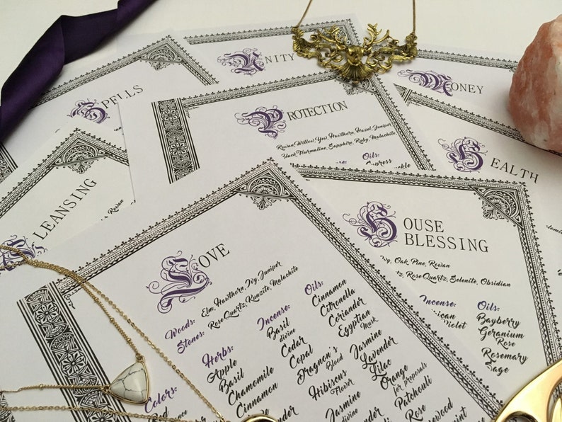 May include: A set of printable cards with decorative borders and purple lettering. Each card features a different type of spell, including "Love", "Protection", "Cleansing", "House Blessing", "Money", and "Health". The cards list ingredients for each spell, including herbs, stones, incense, and oils.