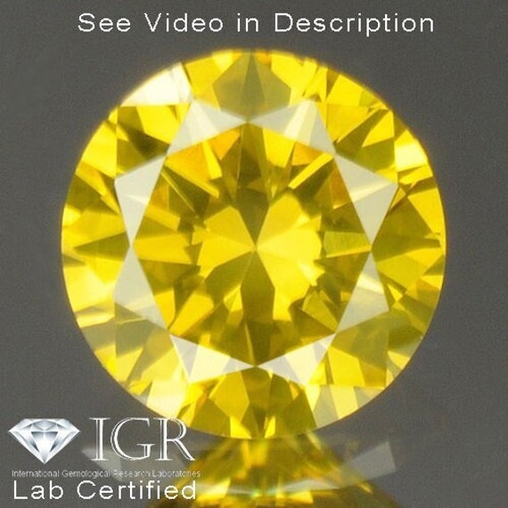 0.20 Cts. CERTIFIED Round Brilliant Cut SI1 Vivid Canary Yellow
