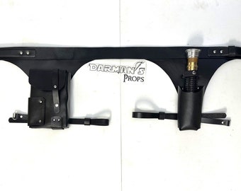 May include: Black leather belt with two pouches, one for a lightsaber and one for other accessories. The belt has a silver buckle and the text "DARMAN'S PROPS" is visible.