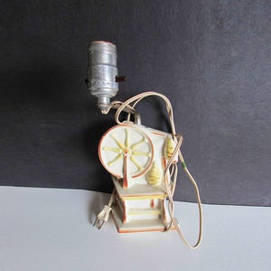 May include: A rustic wooden sign with the text "Welcome to our home" in a handwritten style. The sign features a distressed finish and a simple, inviting design, perfect for a front porch or entryway.