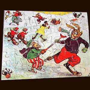May include: A vintage jigsaw puzzle featuring a winter scene with anthropomorphic animals ice skating and playing hockey. The puzzle has a missing piece and includes the text "4070 XI". The artwork is colorful and whimsical.