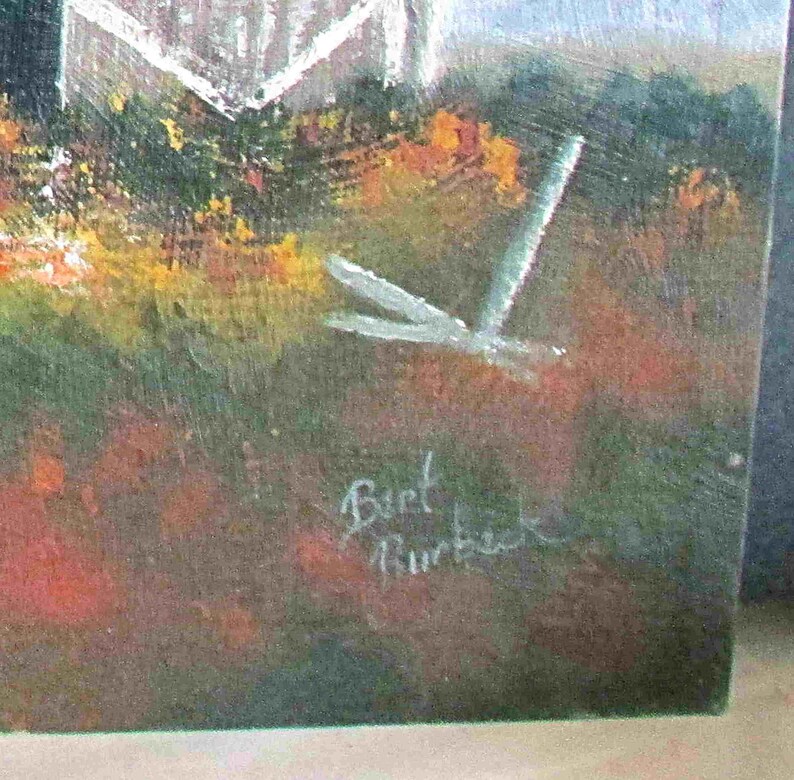 May include: A painting of a white building with a dragonfly in the foreground. The artist's signature, "Bert Hurback", is visible in the bottom right corner.