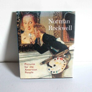 May include: Book cover featuring a painting of a man looking at a woman in a mirror. The title is "Norman Rockwell: Pictures for the American People".