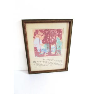 May include: Framed art print titled "At Dawning" with a landscape scene in shades of red, pink, and teal. The print is in a brown wooden frame. The text at the bottom reads "Another day is dawning..." and other lines of poetry.