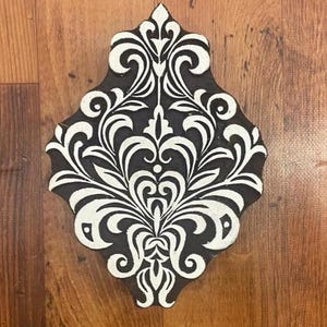 Bloque de madera curvado a mano para hacer impresiones en la India