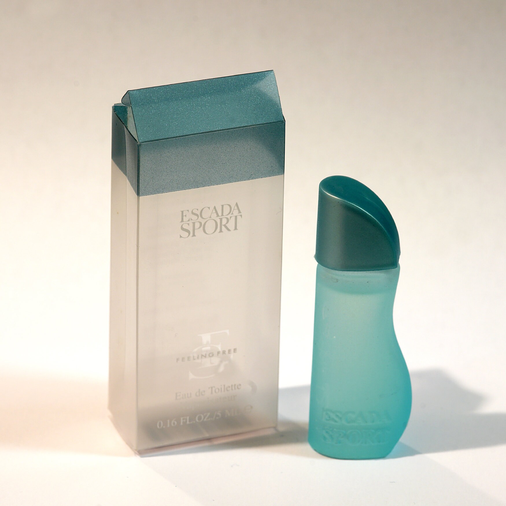 Escada Sport Feeling Free Miniature by Escada, 5ml. Boxed. Bottle 