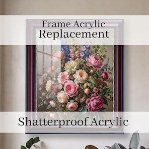 May include: A framed floral print with a burgundy and black frame. The artwork features a bouquet of pink, peach, and white roses, with blue and purple flowers. The text "Frame Acrylic Replacement" and "Shatterproof Acrylic" are displayed.