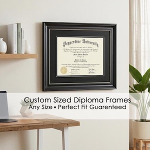 May include: A framed diploma from Pepperdine University, displayed on a wall. The black frame has a silver beaded inner border. The diploma is cream-colored with black text and a gold seal. The text at the bottom of the image reads: "Custom Sized Diploma Frames Any Size • Perfect Fit Guaranteed."