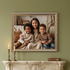 May include: A framed photograph of three smiling children. The frame is gold with a decorative edge. The children are wearing sweaters and are sitting on a couch. Two brass candle holders with lit candles are in the foreground.