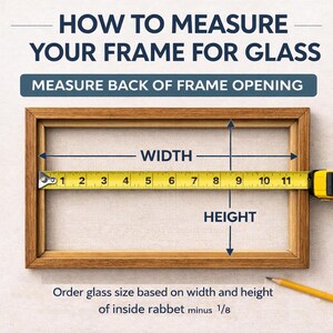 May include: A wooden picture frame with a yellow measuring tape showing width and height measurements. Text reads "HOW TO MEASURE YOUR FRAME FOR GLASS" and "MEASURE BACK OF FRAME OPENING". The frame is approximately 11 inches wide.