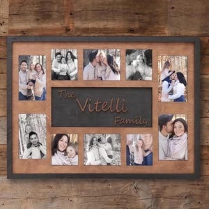 May include: A multi-photo wooden picture frame with a dark gray border. The frame holds ten black and white photos. The center section features the text "The Vitelli Family" in a cursive font. The frame is displayed against a wooden background.