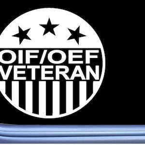 May include: A white circle sticker with three stars and the text "OIF/OEF VETERAN" in black lettering. The circle has a black and white striped pattern resembling an American flag.